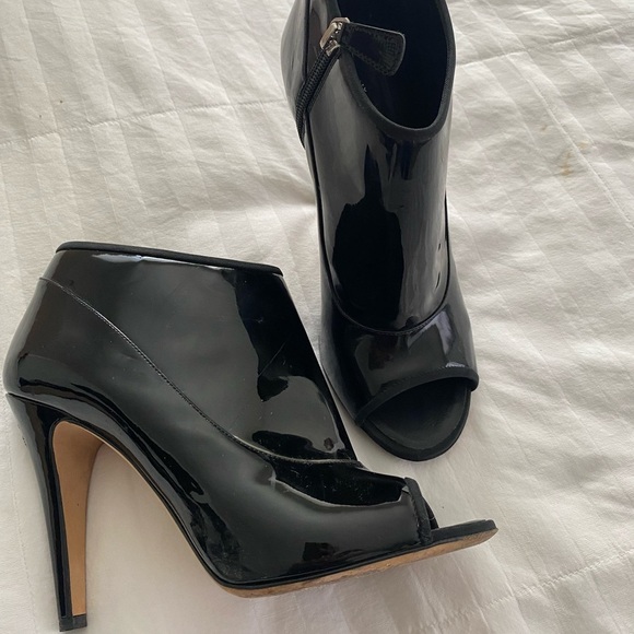 Authentic Chanel Patent Leather Peep Toe Booties
Size: 40 - Picture 10 of 12